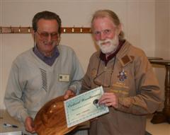 The monthly Highly commended Geoff Hunt received his certificate from Stephen Cooper